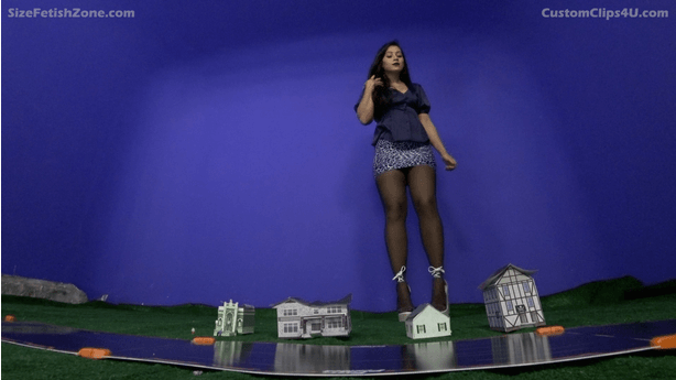 The idea came from an episode of the Land of the Giants but more extensive. You'll need 1 or two ho/oo scale houses (any type but as long as they're 1 story ) with removable roof and ho/oo scale figures I'd also want her to wear pantyhose The video starts off with the camera looking up at the roof. A loud banging takes place(you knocking on the roof) You remove the roof and look inside with a bright happy smile on your face. You look at the little people and greet them. You say you have a little surprise for the tiny folk and then take a cup filled with dirt and empty onto the camera as if she is burying the little ones- laughing while she does it. Added screams and sounds of panic would be nice The next house you repeat the roof removal but you have a water bottle in hand. You take a swig of the water look down and asks,'Are you tiny people thirsty? No? Who cares!' You take another swig then empty to contents of your mouth onto the camera.You proceed to pour water into the building POV style like you are splashing the viewer- laughing while you do it.Again added screams The third house you remove the roof and and say to the viewer, again POV style from within the house, "I'm out of lipgloss and you tiny folk can help!' She smiles evilly and she reaches into the house and pulls out a couple of the figures. She proceeds to bite off their heads and use the corpses and use their insides to moisturize her lips. The fourth house is shot outside the house and there are tiny folk scattered about. Her feet appear menacingly and she crouches over the building. You pick up the building and look inside. You then begin making out and kissing and licking the building passionately . After making out with the building. you remove the roof and say hello to the folks within, maybe waving to them. She tells the occupants that their decor is really ugly but you can help. She then put your foot inside the building, pretending to crush the people and anything inside .Again, sounds of tinies screaming She then addresses the people scattered around the ground and say "poor little people- all homeless. I'll give you a good home!" She then proceeds to pickup the figures in the palm of one hand- say goodbye to them then lick them off your hand with an evil grin on her face.