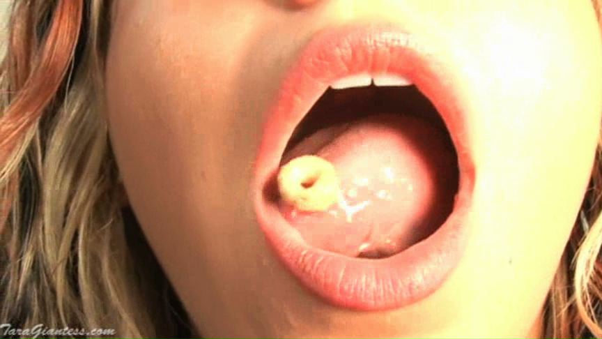 <p>Tara Turned some people into cheerios and she eats most of them one by one. We get great views of them inside her mouth as well.</p>